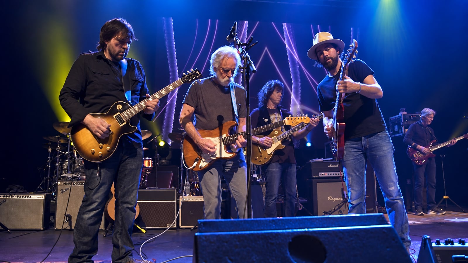 Nathan Dale performing live with a band