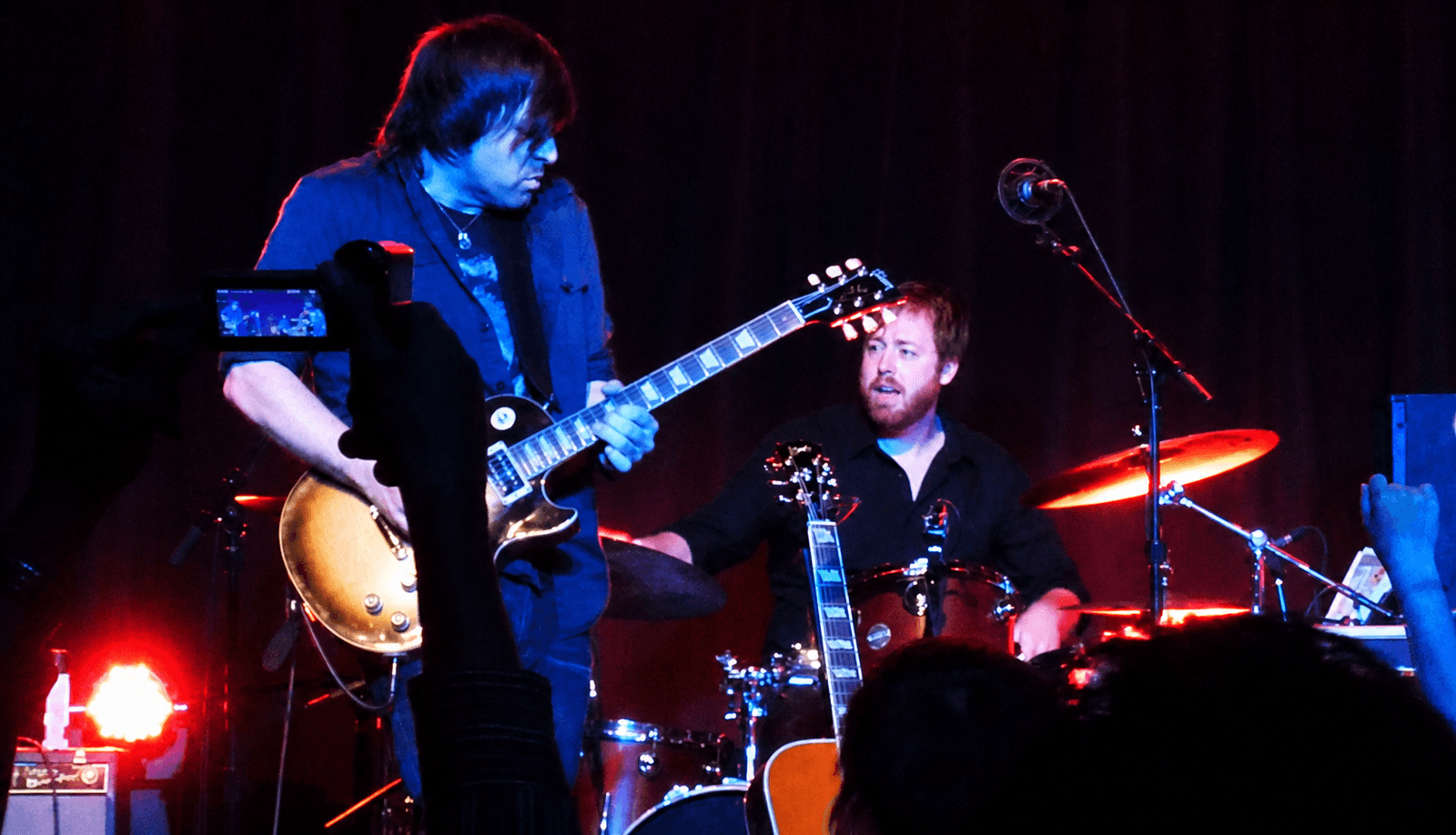 Nathan Dale playing electric guitar with drummer Joe Russo at Brooklyn Bowl in Brooklyn, New York, in 2011