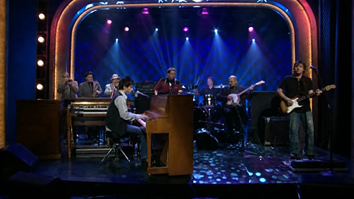 Jackie Greene, Nathan Dale, and band performing on Late Night with Conan O'Brien in 2006