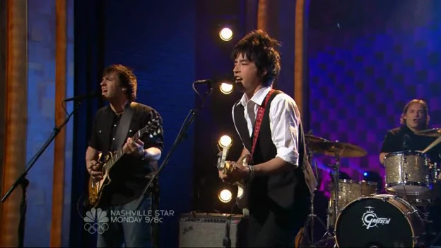 Nathan Dale on guitar, Jackie Greene, and Bruce Spencer on drums performing on Late Night with Conan O'Brien in 2008
